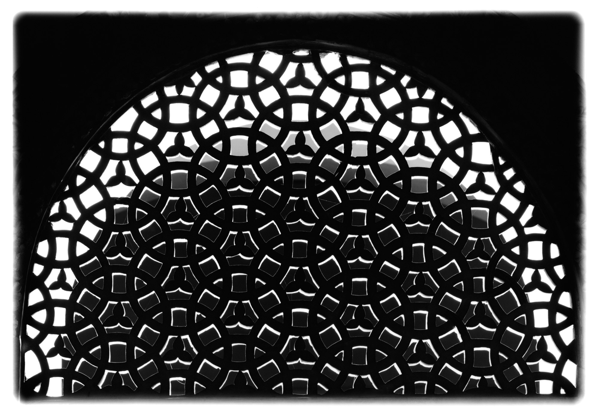 From the Portfolio "Umayyad Grilles." Photographs created in Damascus National Museum from reconstructed artifacts discovered in the ruins of the Umayyad palace Qasr al-Hayr al-Gharbi, built by the Caliph Hisham ibn Abd al-Malik in the early 8th c. on route from Damascus to Palmyra, Tadmur. File No. 0512-53-1. Trefoil and Fanlight Tympanum Grille
