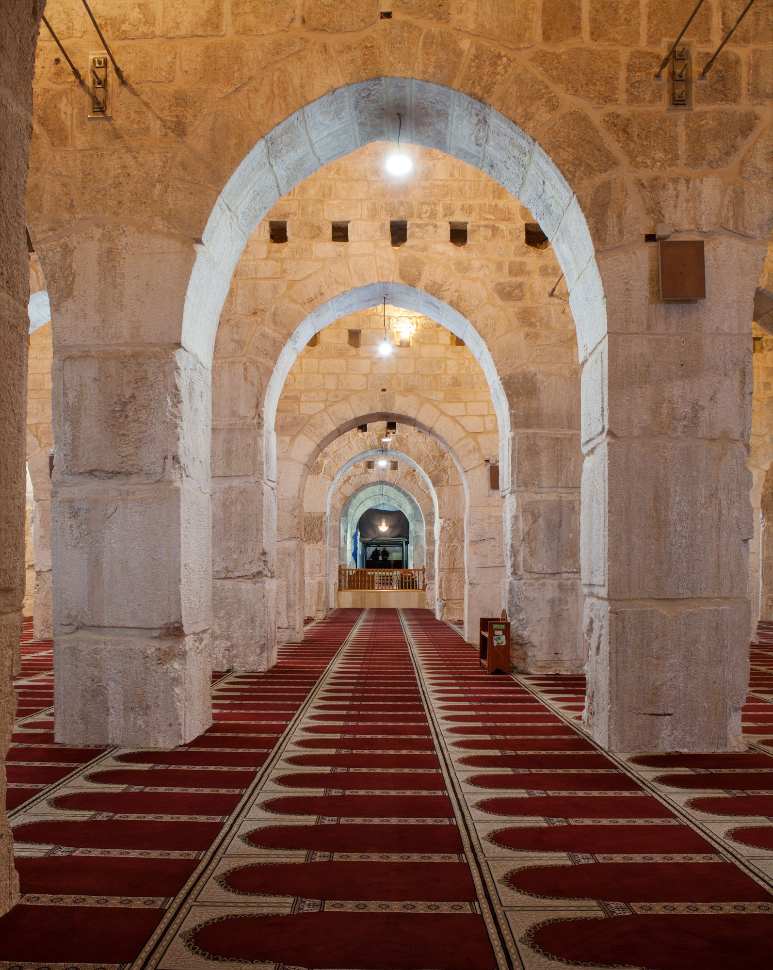 Transverse vertical views westward through irregularly concentric arcades. Mosque of Mu’awiya. Photographs of the proposed Mosque of Mu'awiya, in the space of the new Musalla Marwani in the southeast corner of the Masjid al-Aqsa, or Haram al-Sharif.