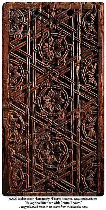 Carved wooden structural elements preserving early ornamental vocabularies.