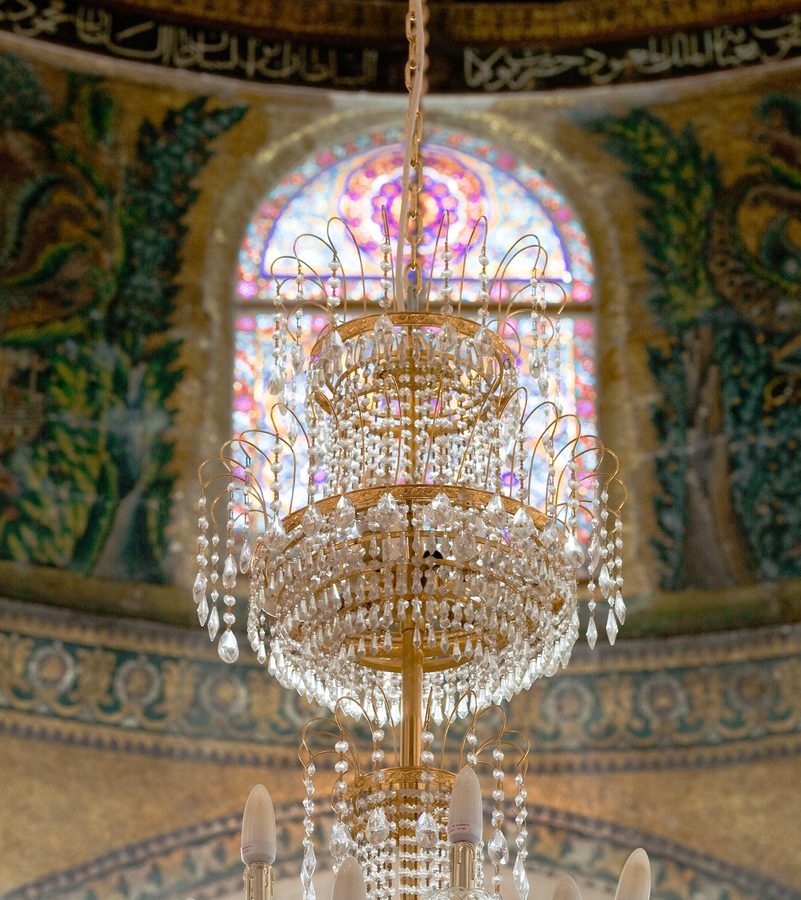 Chandelier Beneath Stained Glass
